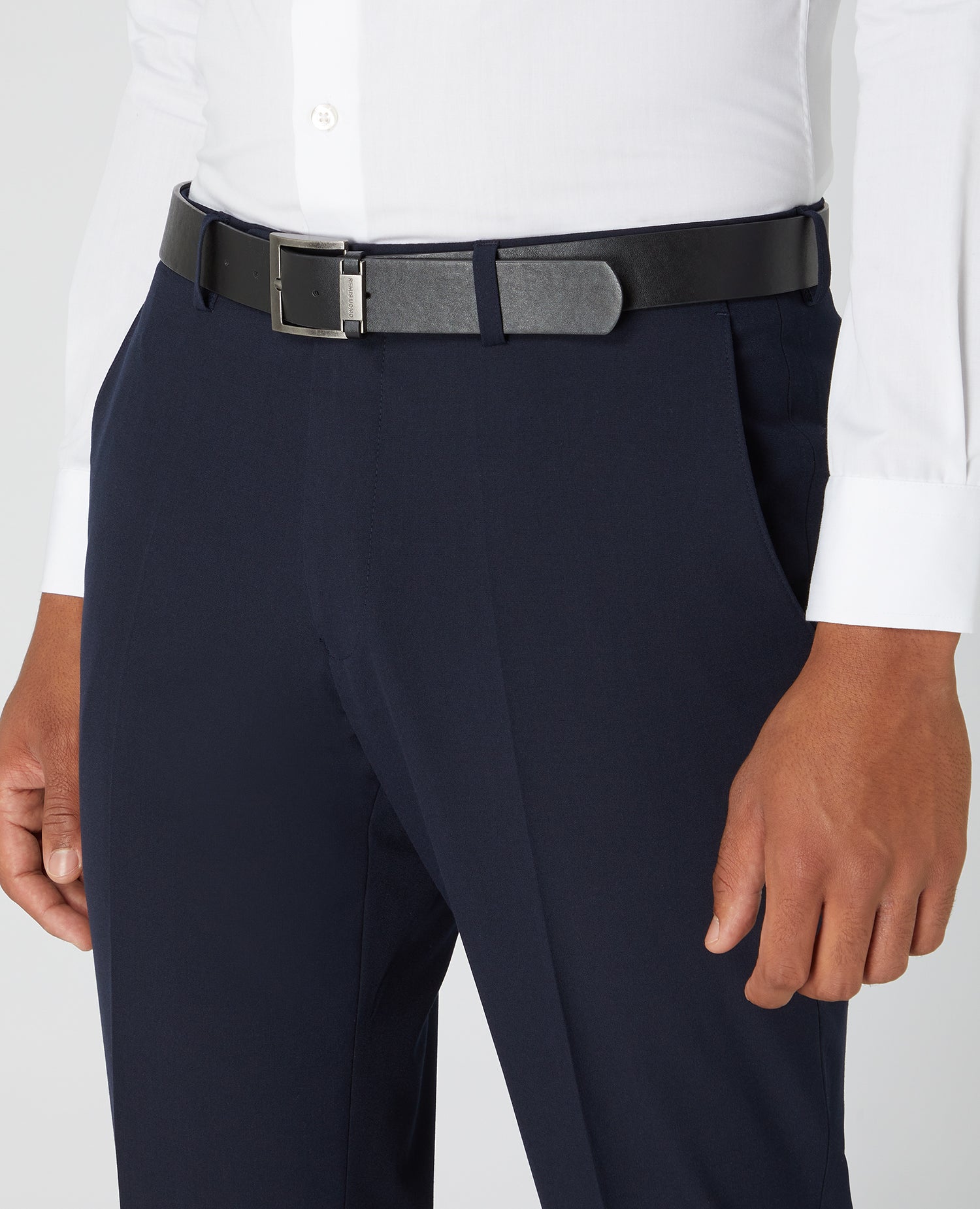Man wearing a navy Slim Leg Formal Trousers
