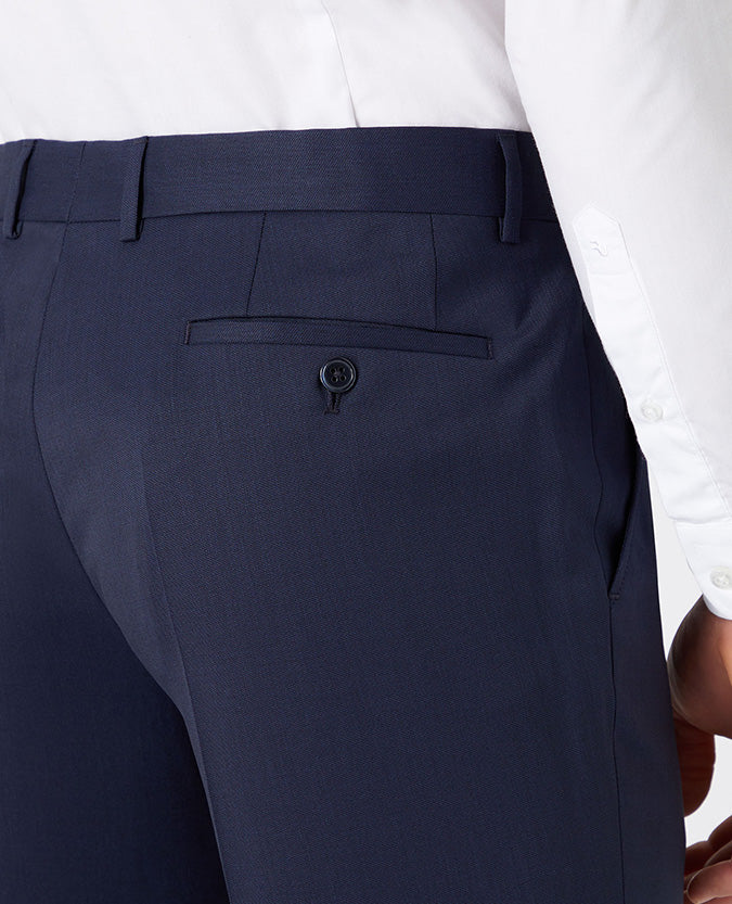 Man wearing a navy Slim Fit Wool-Blend Stretch Mix and Match Trousers