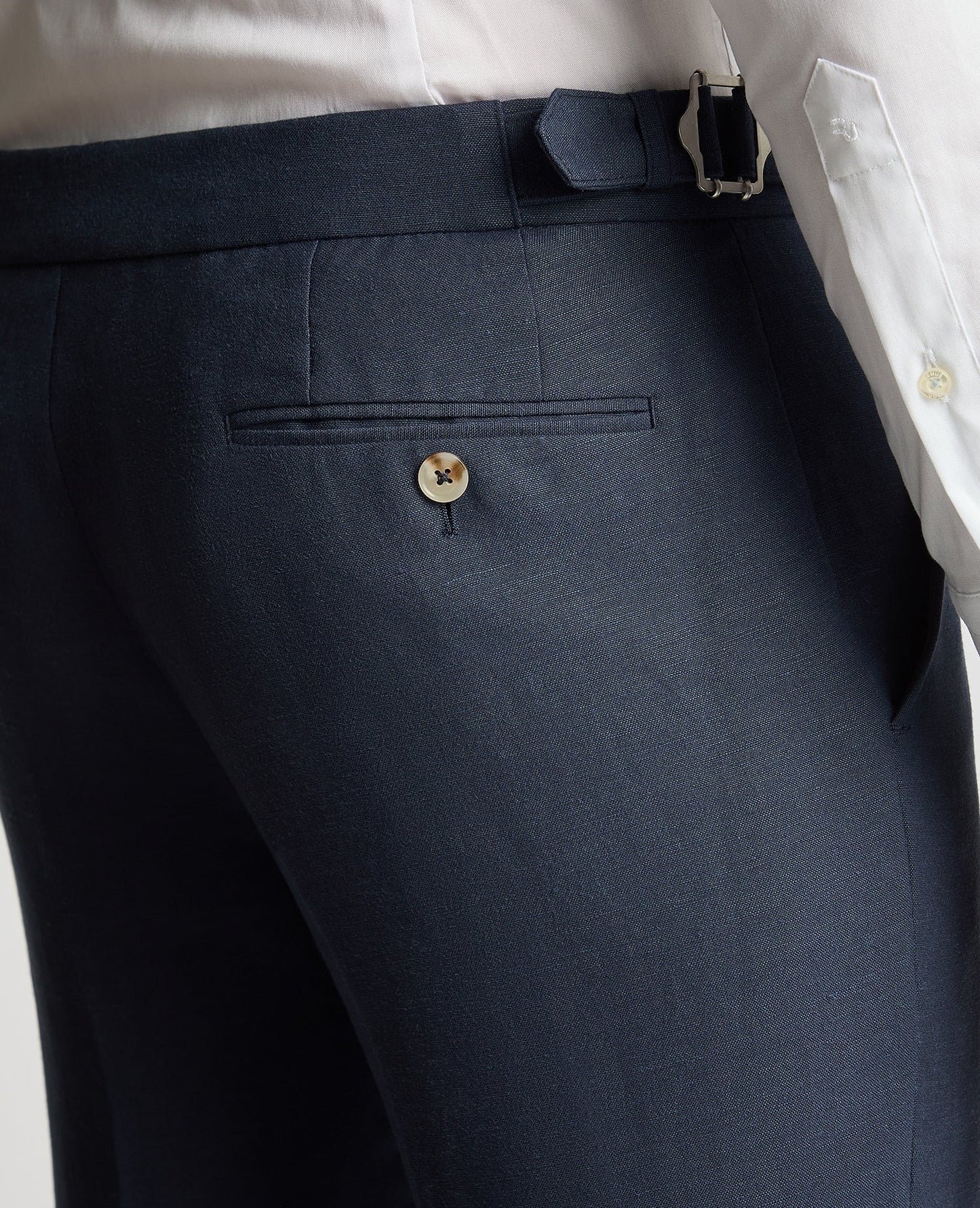 Man wearing a blue Slim Leg Linen-Blend Formal Trousers