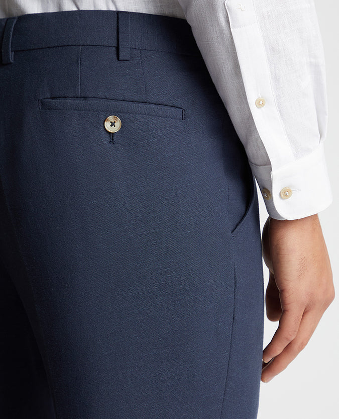 Man wearing a blue Tapered Fit Linen-Blend Formal Trousers