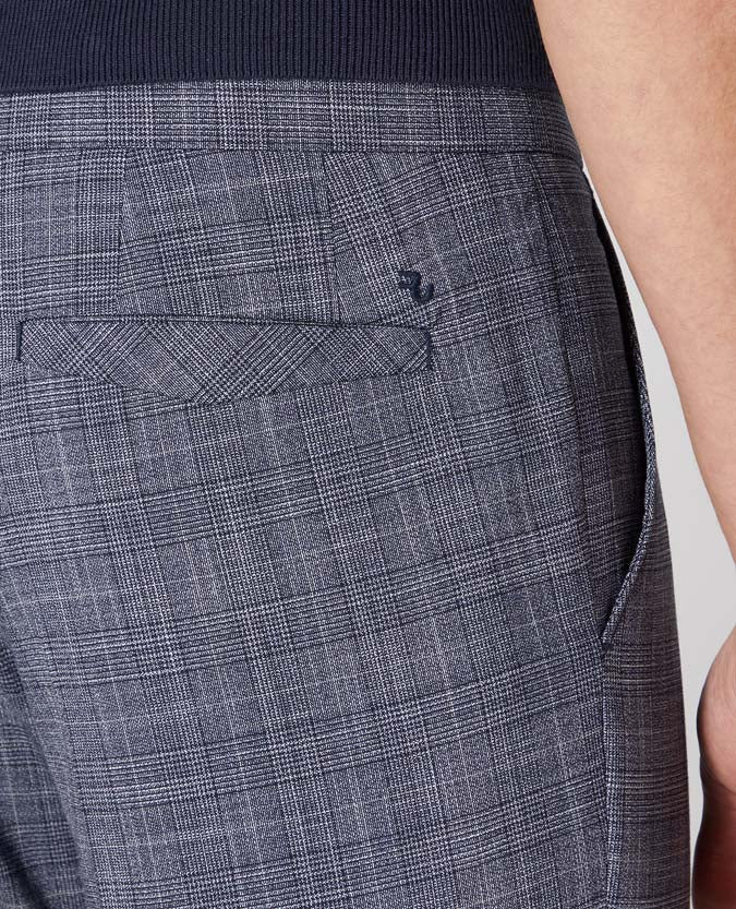 Man wearing a blue X-Slim Leg Checked Stretch Trouser