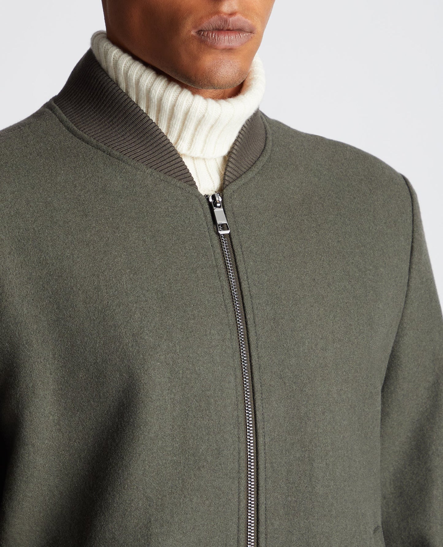 Man wearing a green Tapered Fit Wool-Blend Bomber Jacket