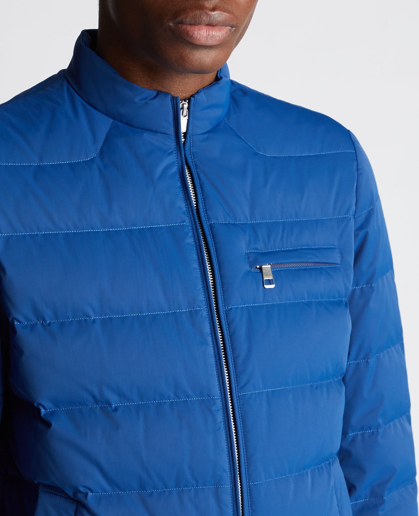 Man wearing a blue Regular Fit Quilted Jacket