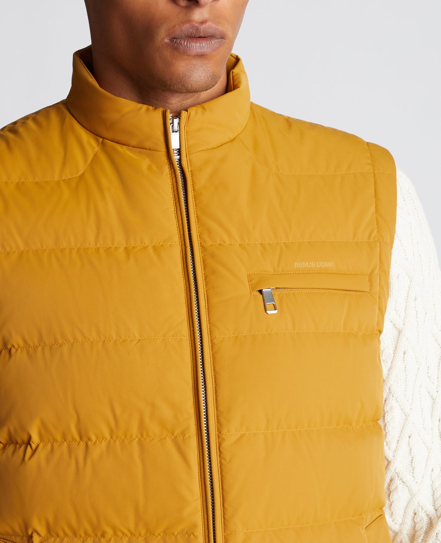 Man wearing a orange Regular Fit Quilted Gilet