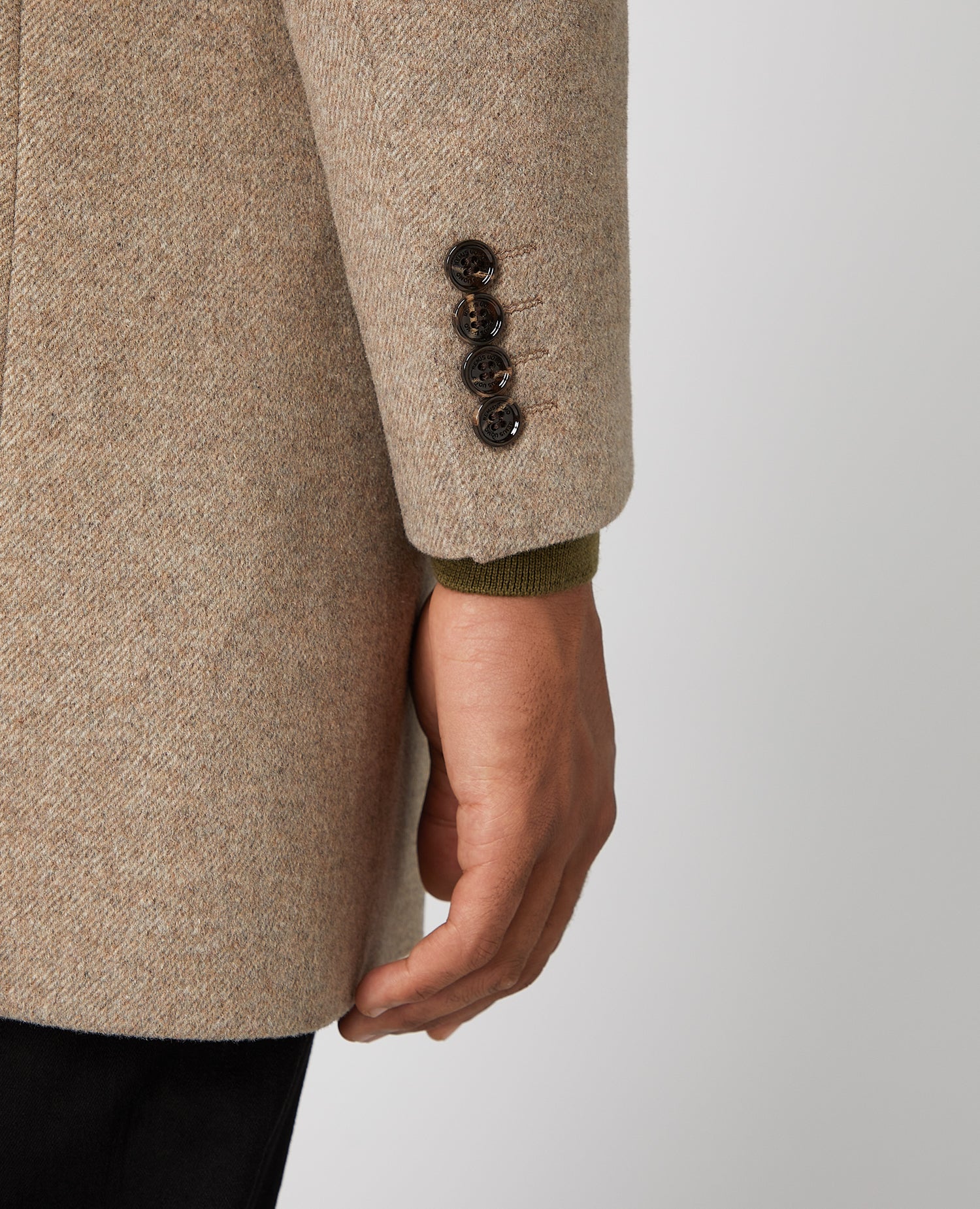 Man wearing a sand Slim Fit Wool-Rich Tailored Coat