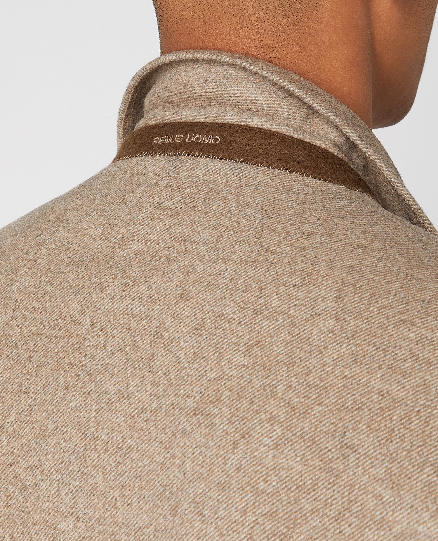 Man wearing a sand Slim Fit Wool-Rich Tailored Coat