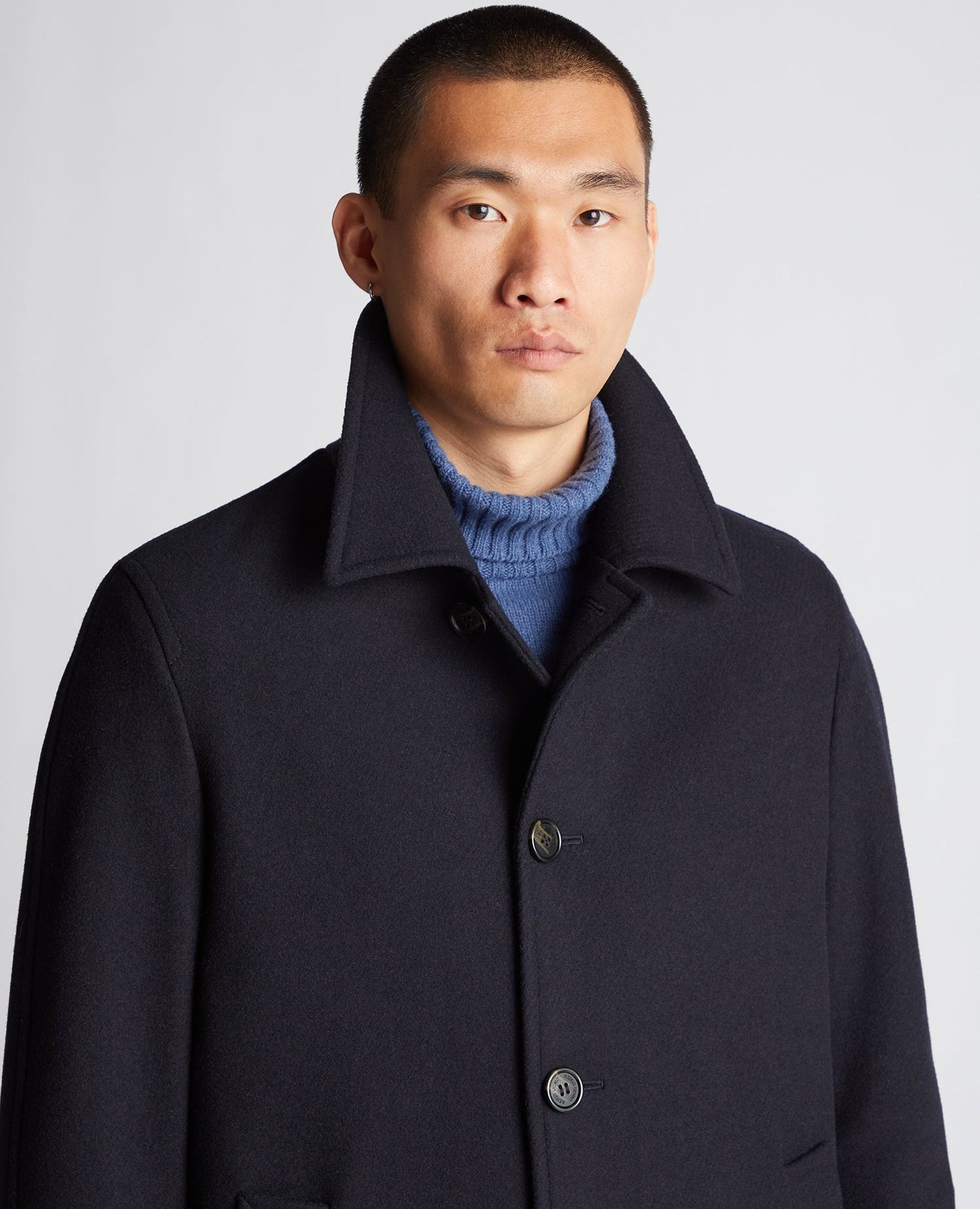 Man wearing a navy Relaxed Fit Wool-Blend Tailored Coat