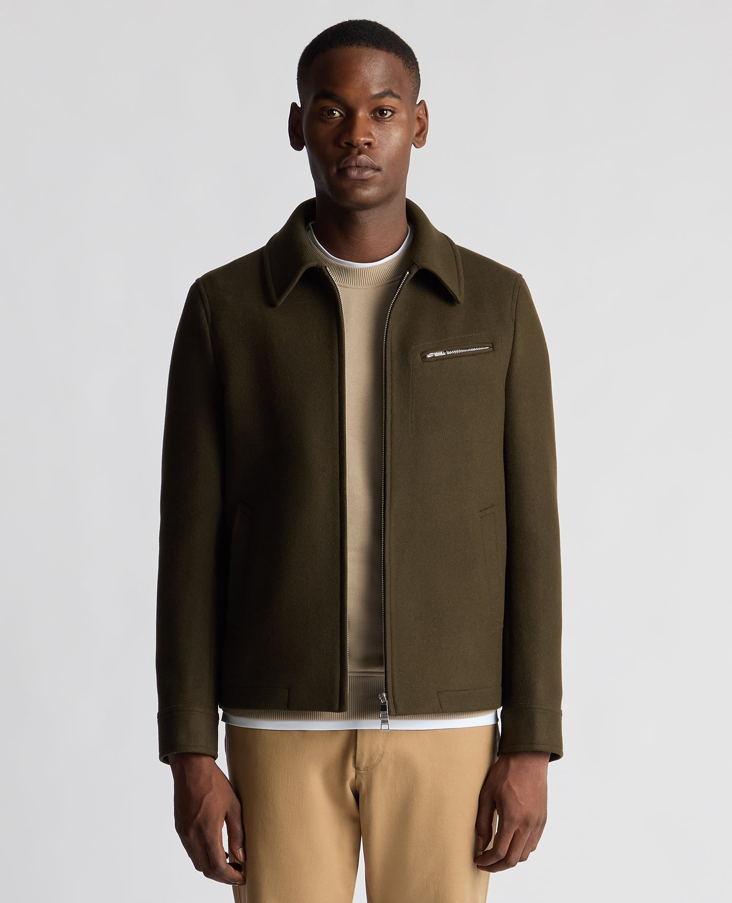 Man wearing a green Tailored Fit Italian Wool Blend Jacket