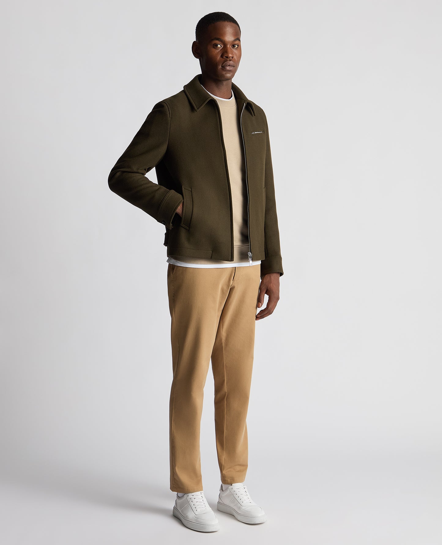 Man wearing a green Tailored Fit Italian Wool Blend Jacket