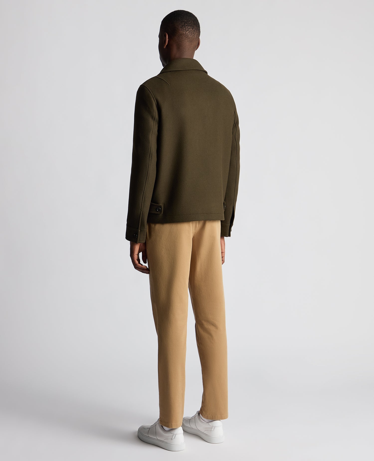 Man wearing a green Tailored Fit Italian Wool Blend Jacket