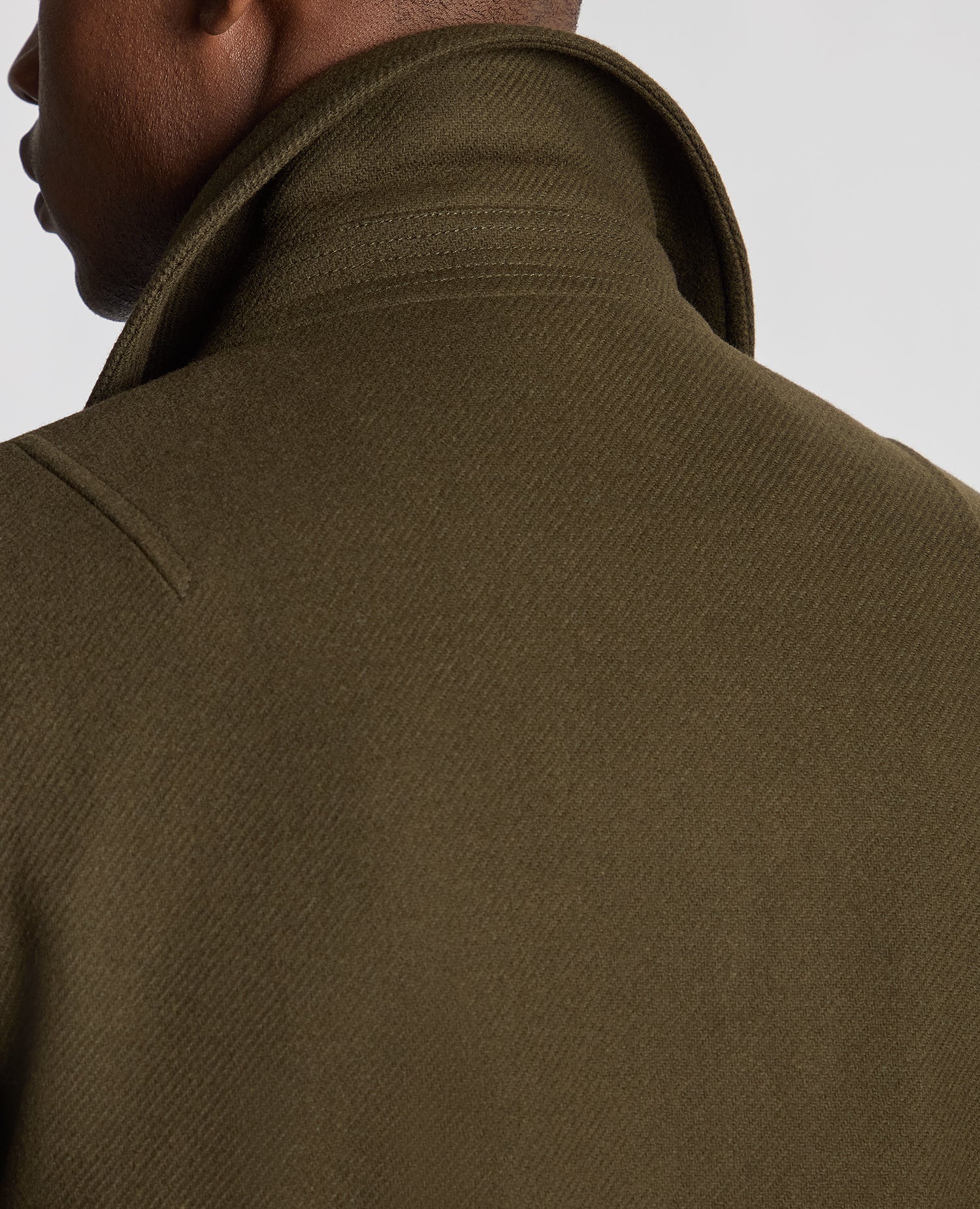 Man wearing a green Tailored Fit Italian Wool Blend Jacket