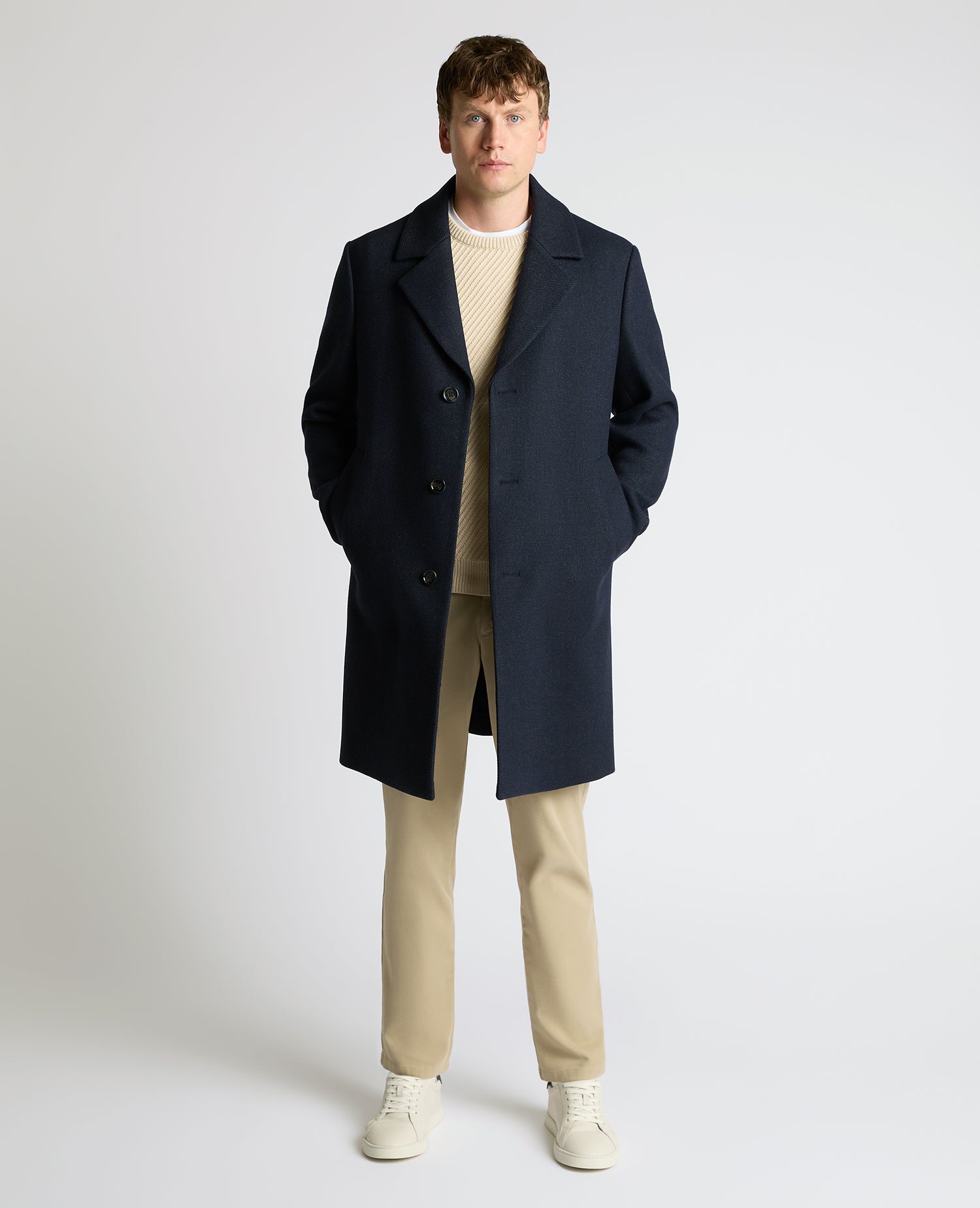 Man wearing a navy Dylan Relaxed Fit Wool Blend Coat