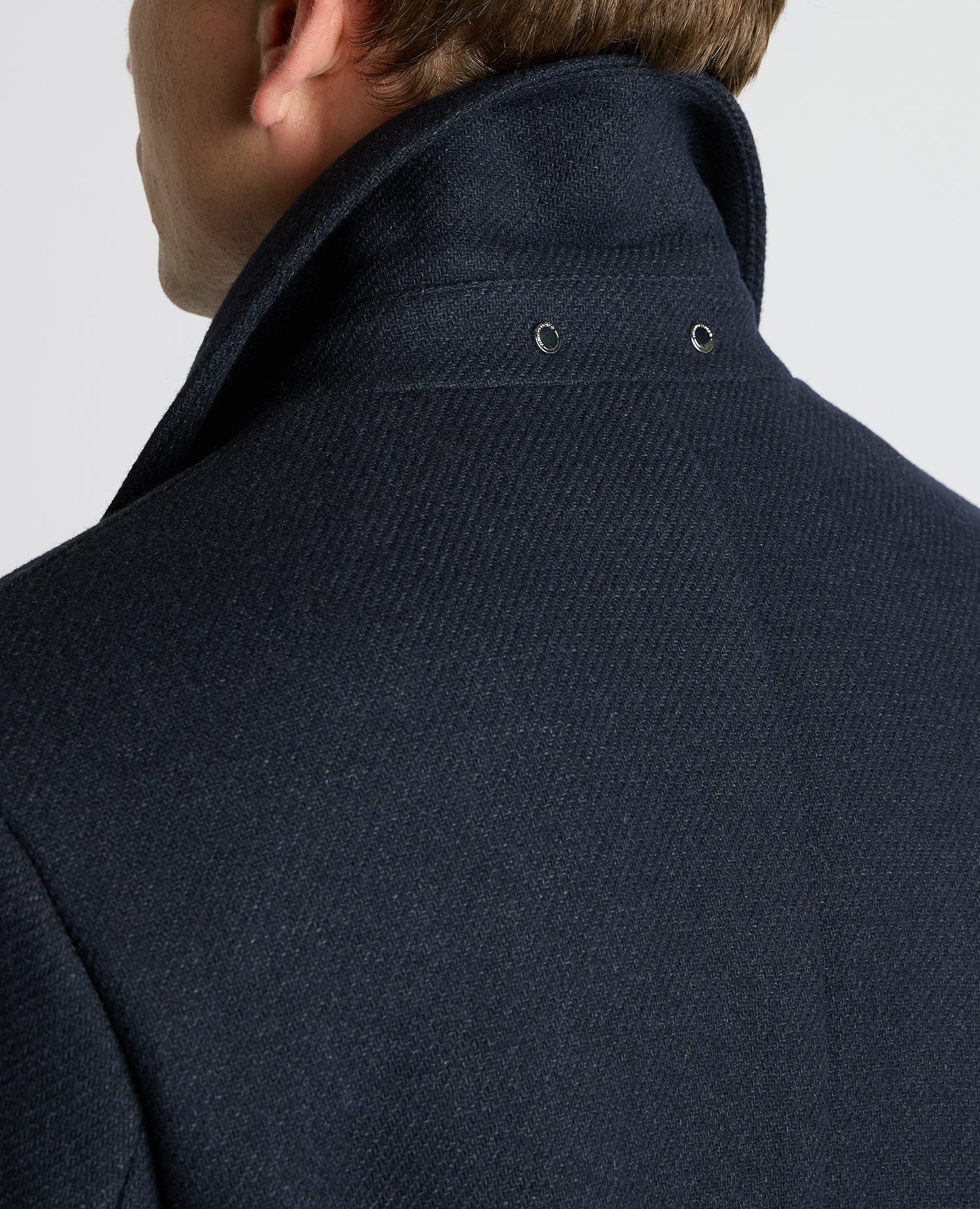 Man wearing a navy Dylan Relaxed Fit Wool Blend Coat