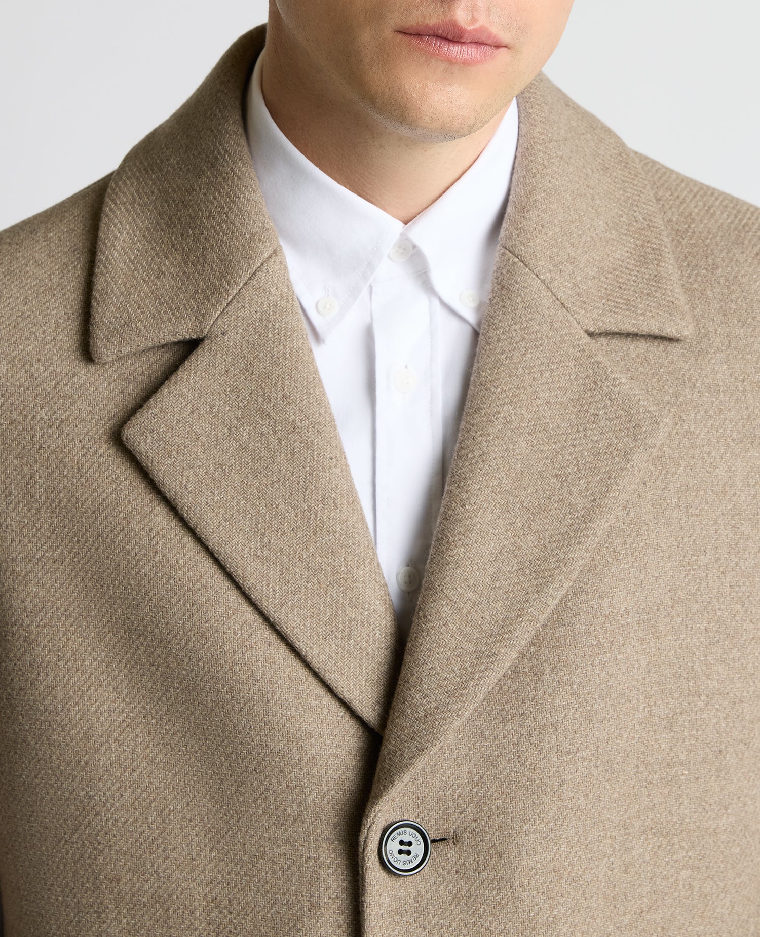 Man wearing a sand Dylan Relaxed Fit Wool Blend Coat