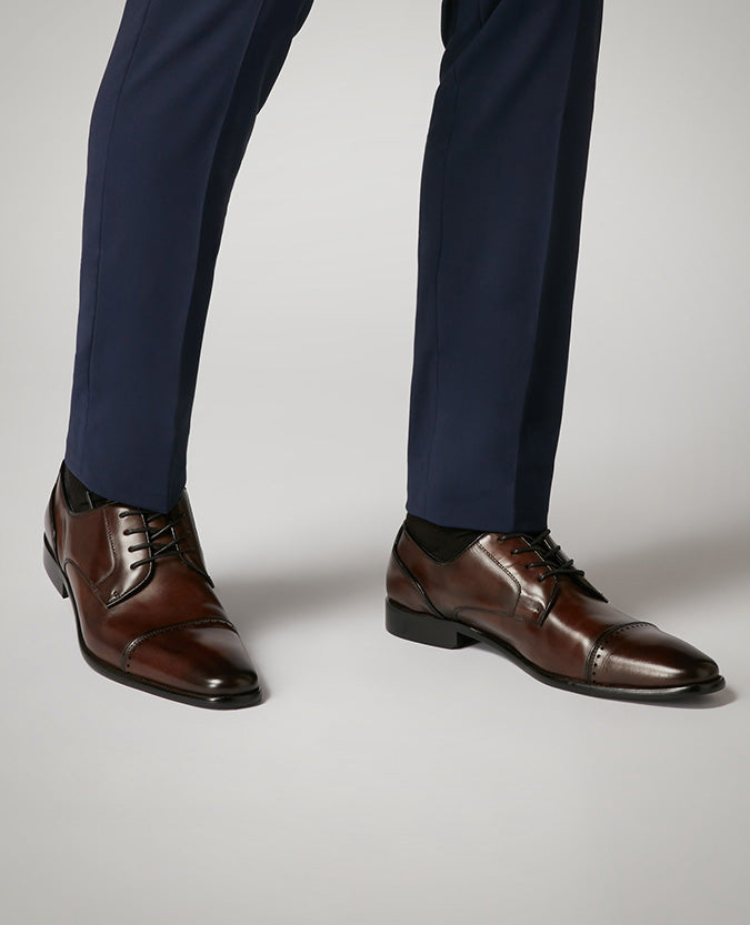 Man wearing a brown Leather Bonucci Shoe