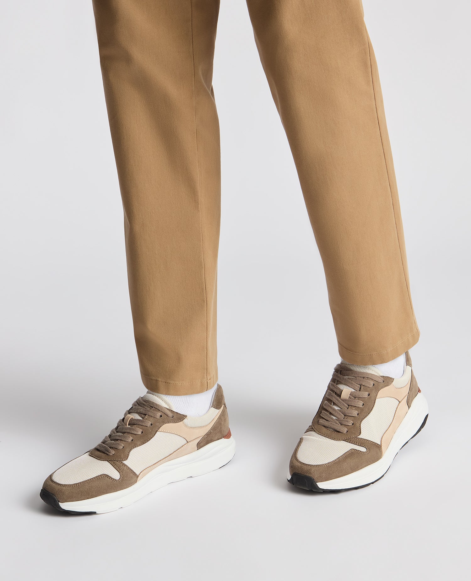 Man wearing a sand Suede Albi Trainer