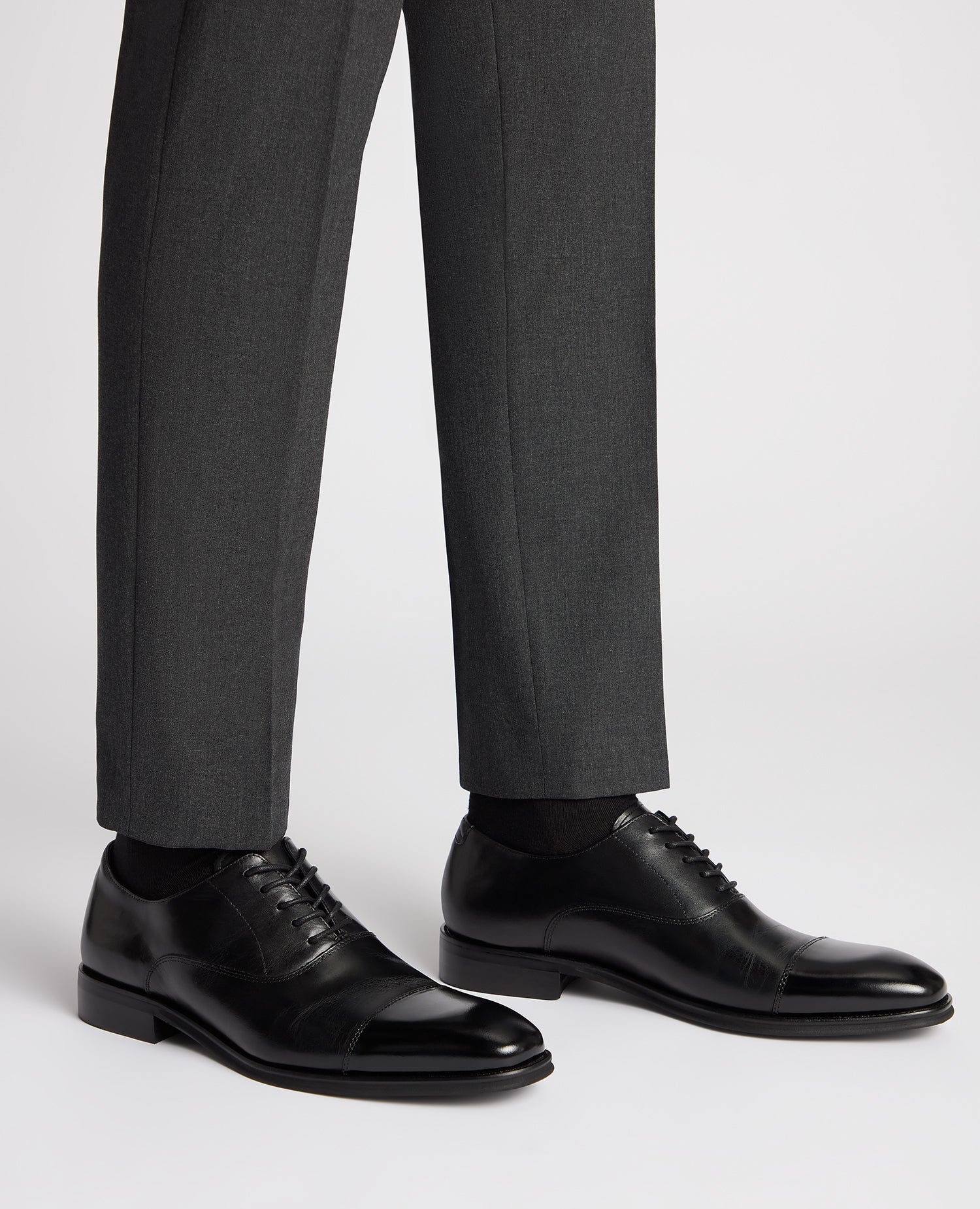 Man wearing a black Leather Garda Shoe