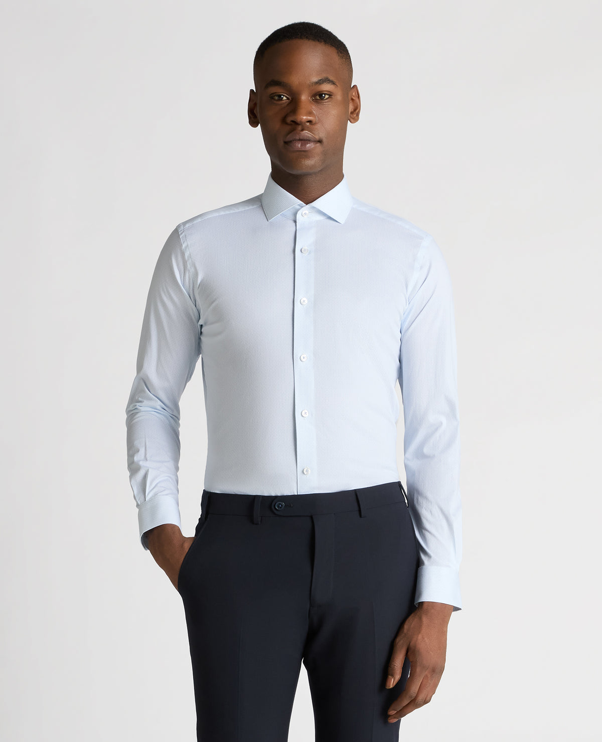 Man wearing a blue Slim Fit Cotton-Stretch Shirt
