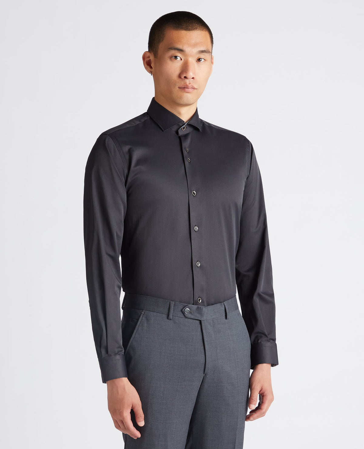 Man wearing a black Tapered Fit Cotton-Blend Stretch Shirt