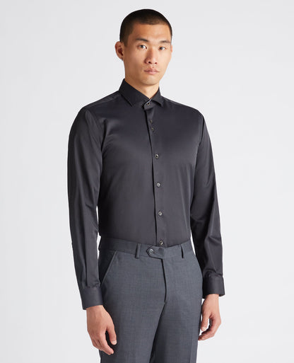 Man wearing a black Tapered Fit Cotton-Blend Stretch Shirt