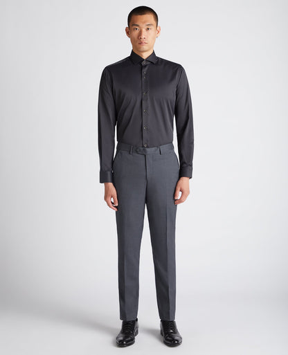 Man wearing a black Tapered Fit Cotton-Blend Stretch Shirt