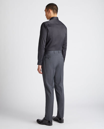 Man wearing a black Tapered Fit Cotton-Blend Stretch Shirt