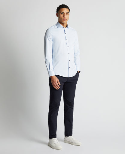 Man wearing a blue Tapered Fit Cotton-Blend Stretch Shirt