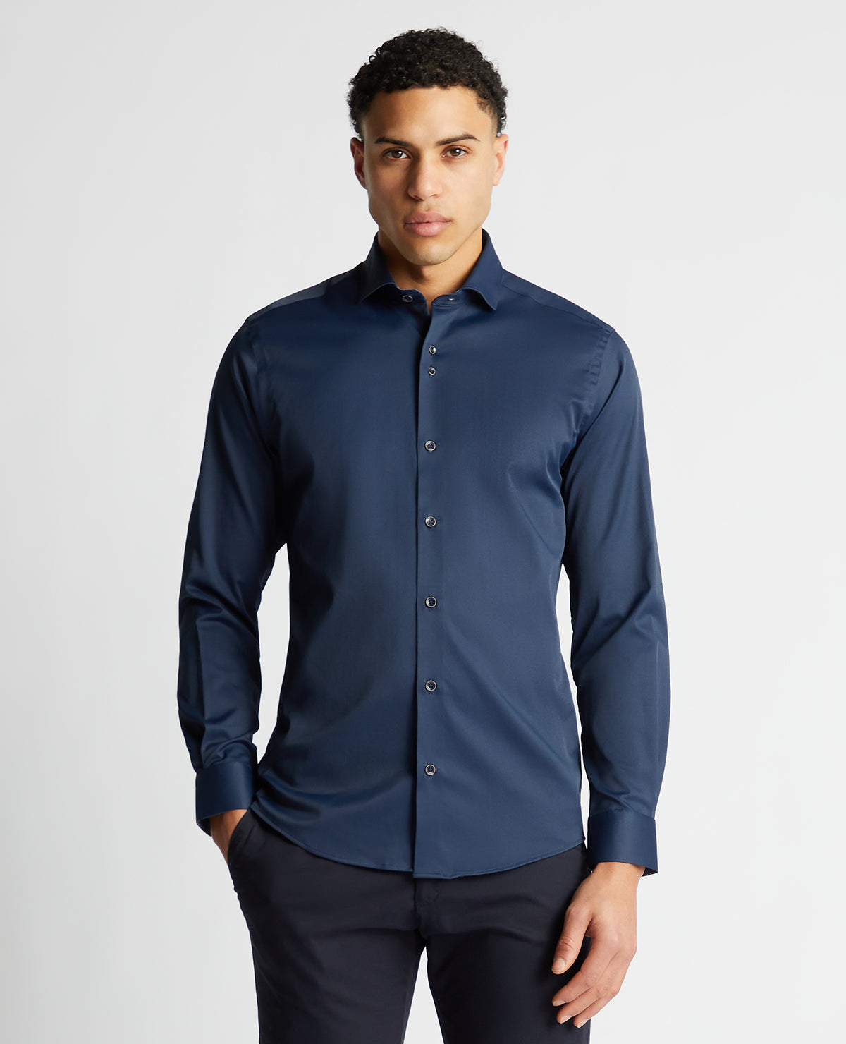 Man wearing a navy Tapered Fit Cotton-Blend Stretch Shirt