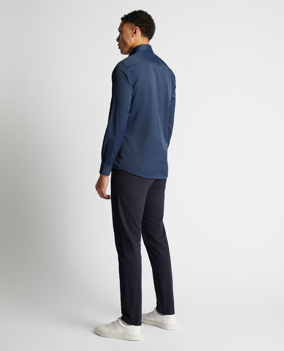 Man wearing a navy Tapered Fit Cotton-Blend Stretch Shirt