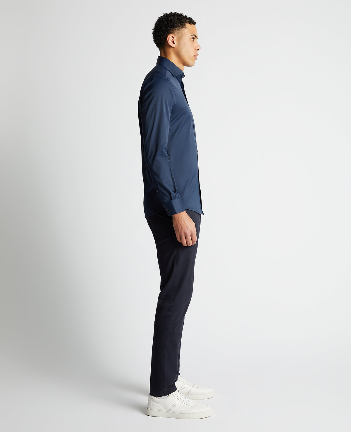 Man wearing a navy Tapered Fit Cotton-Blend Stretch Shirt
