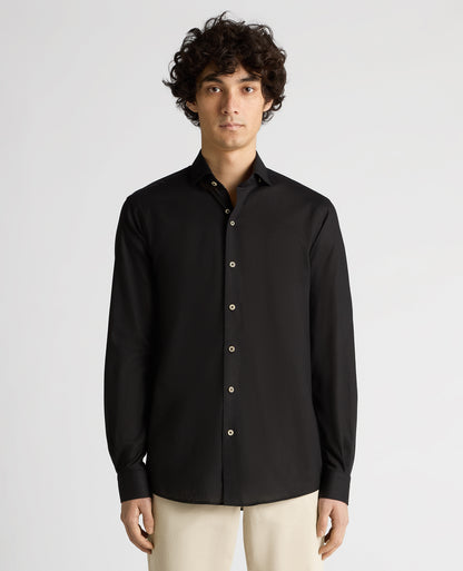 Man wearing a black Tapered Fit Cotton-Linen Blend Shirt