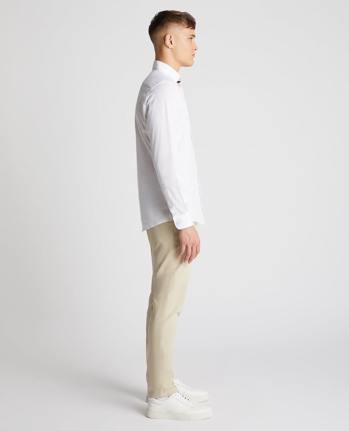 Man wearing a white Tapered Fit Cotton-Linen Blend Shirt