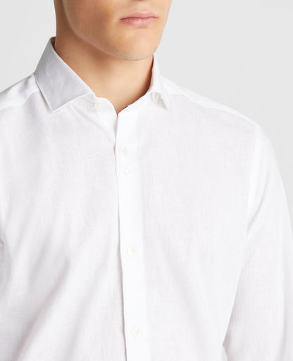 Man wearing a white Tapered Fit Cotton-Linen Blend Shirt
