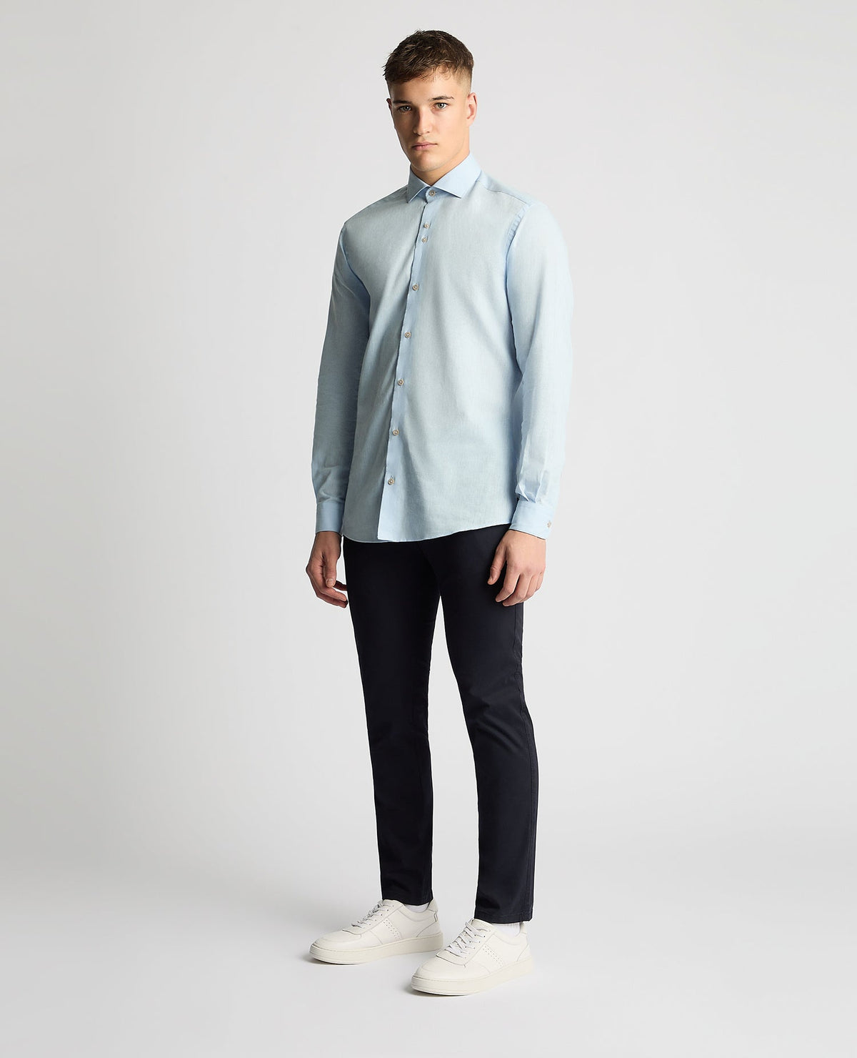 Man wearing a blue Tapered Fit Cotton-Linen Blend Shirt