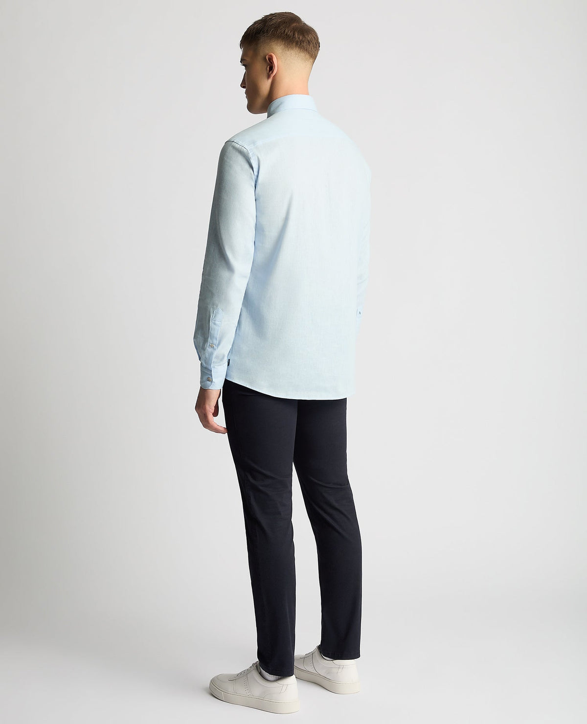 Man wearing a blue Tapered Fit Cotton-Linen Blend Shirt