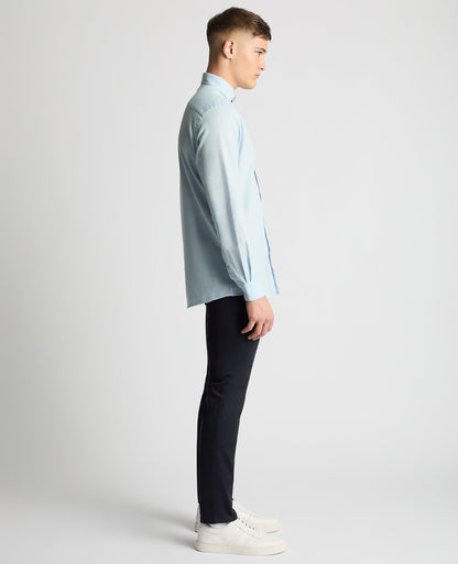 Man wearing a blue Tapered Fit Cotton-Linen Blend Shirt