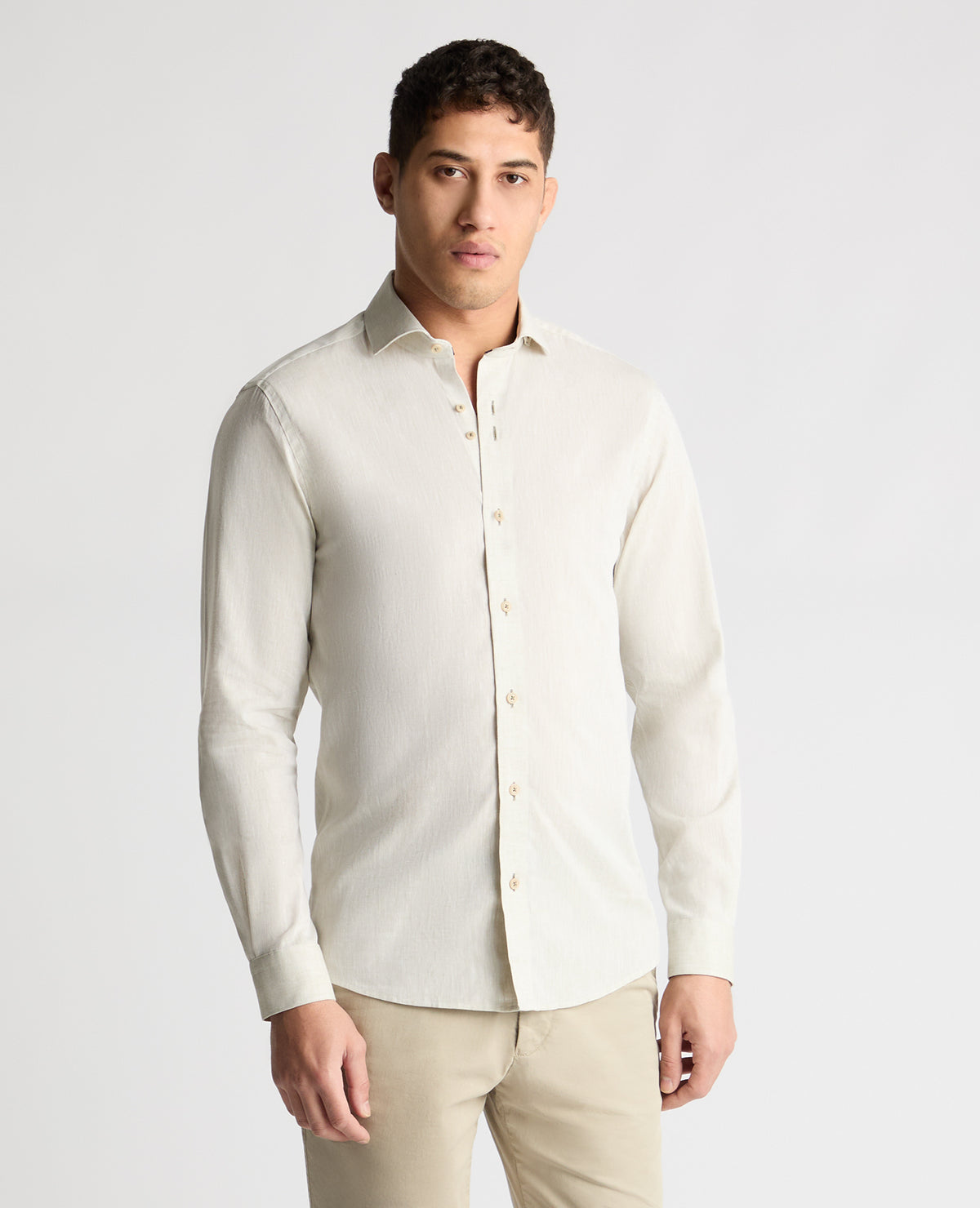 Man wearing a green casual shirt