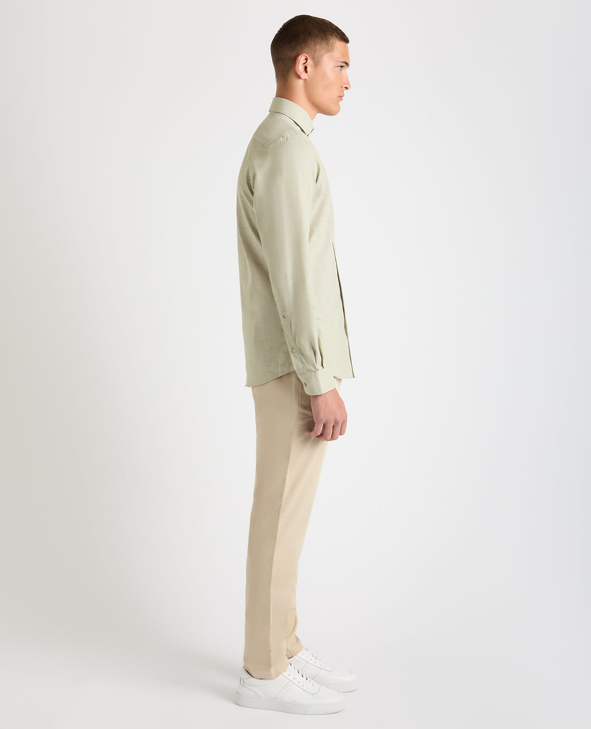 Man wearing a green Tapered Fit Cotton-Linen Blend Shirt