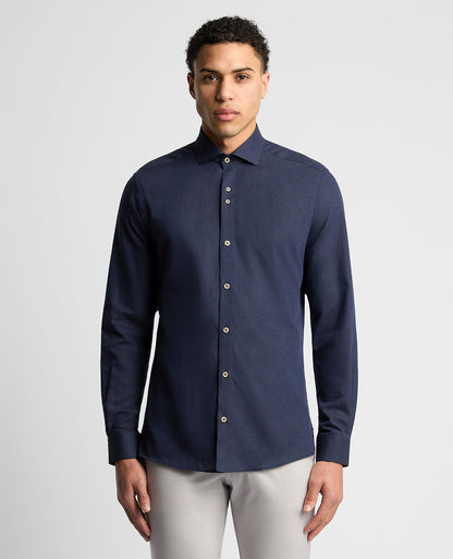 Man wearing a navy Tapered Fit Cotton-Linen Blend Shirt