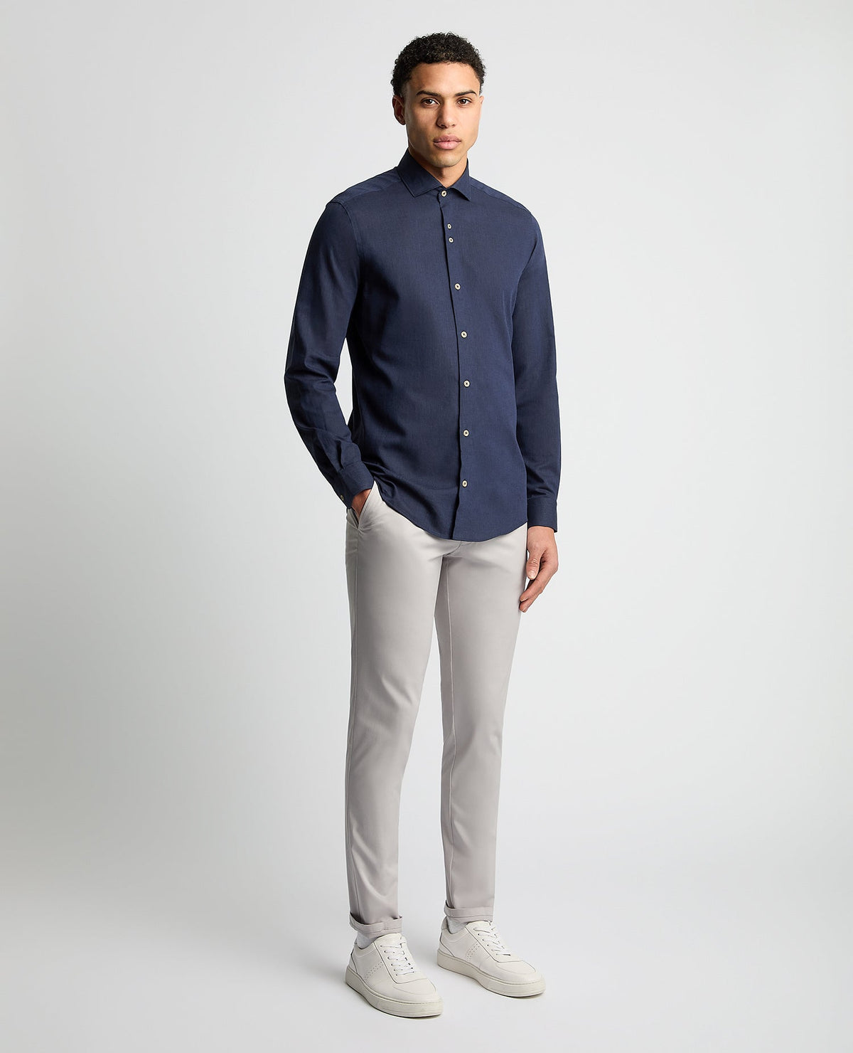 Man wearing a navy Tapered Fit Cotton-Linen Blend Shirt