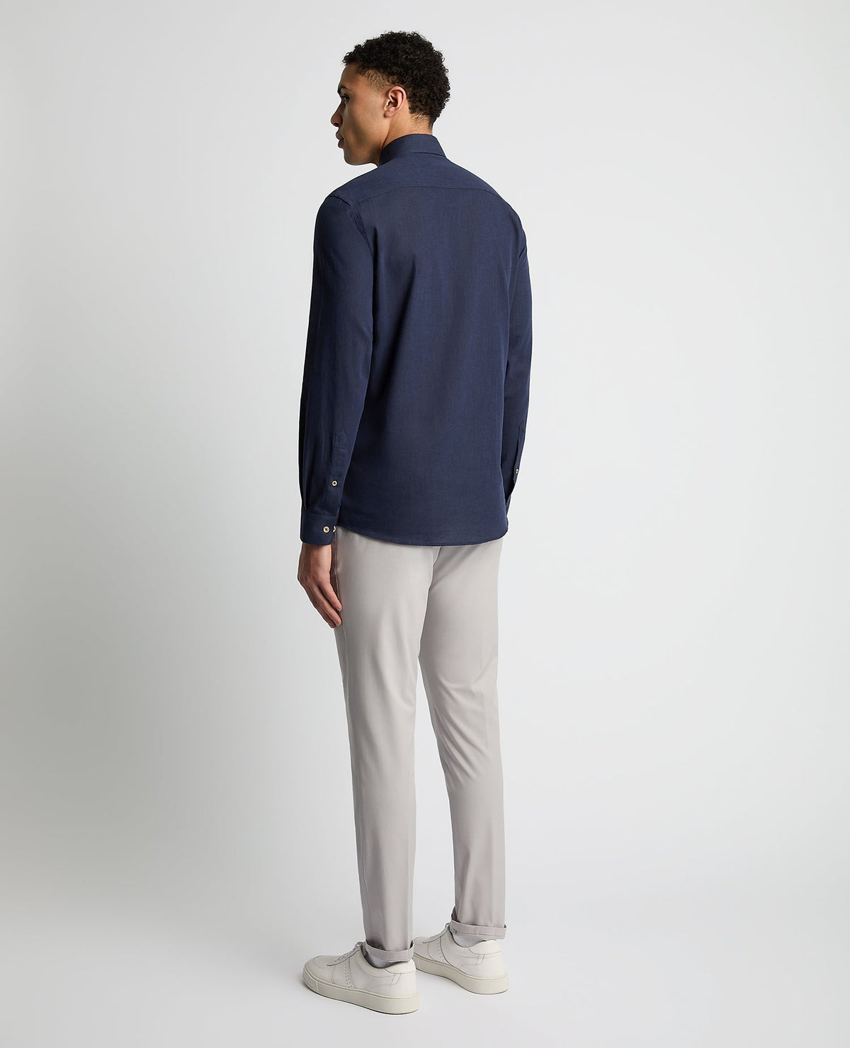 Man wearing a navy Tapered Fit Cotton-Linen Blend Shirt