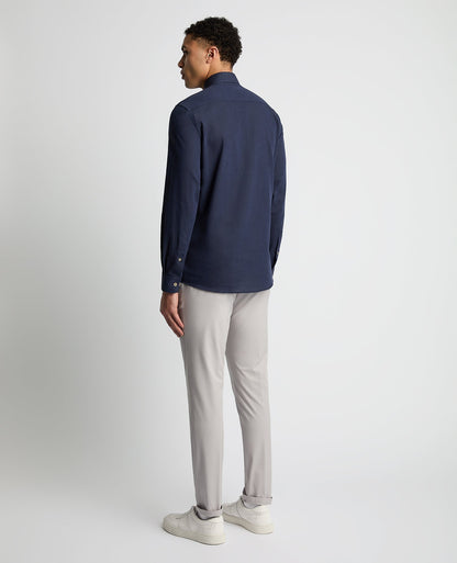Man wearing a navy Tapered Fit Cotton-Linen Blend Shirt