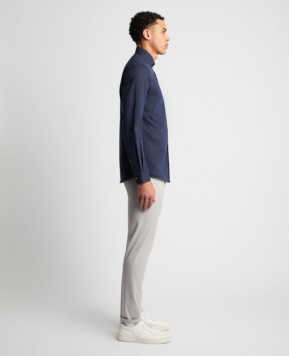 Man wearing a navy Tapered Fit Cotton-Linen Blend Shirt