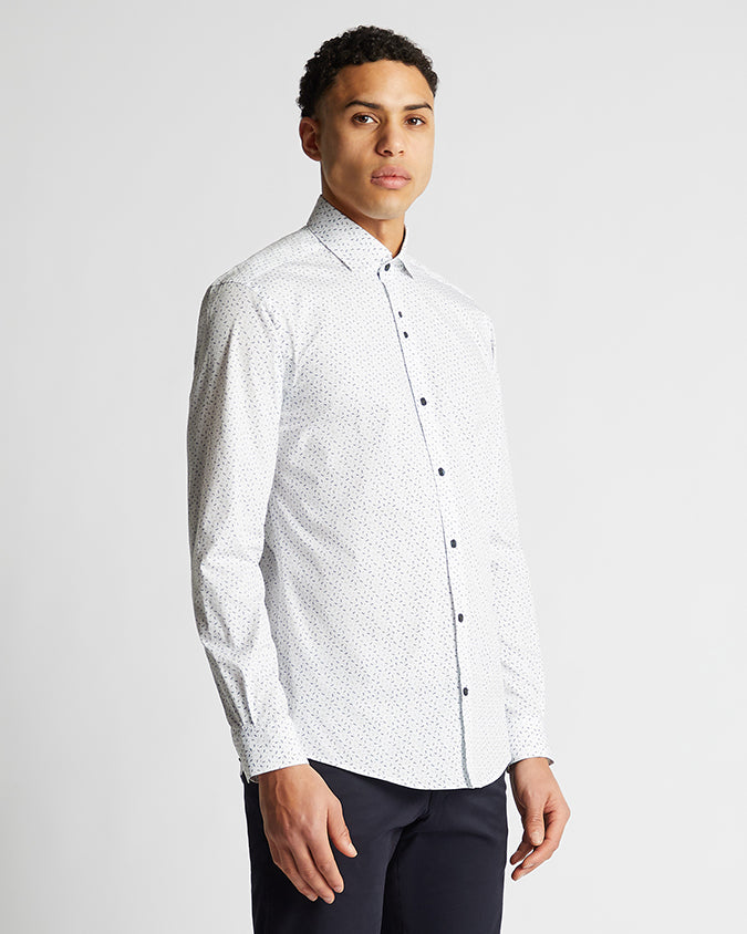 Man wearing a navy Tapered Fit Cotton Stretch Shirt
