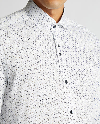 Man wearing a navy Tapered Fit Cotton Stretch Shirt