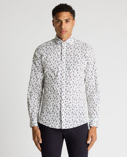Man wearing a navy Tapered Fit Floral Cotton-Stretch Shirt