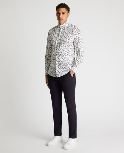 Man wearing a navy Tapered Fit Floral Cotton-Stretch Shirt