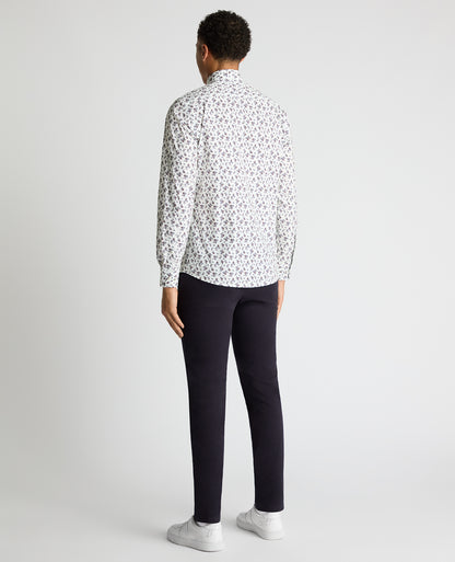 Man wearing a navy Tapered Fit Floral Cotton-Stretch Shirt