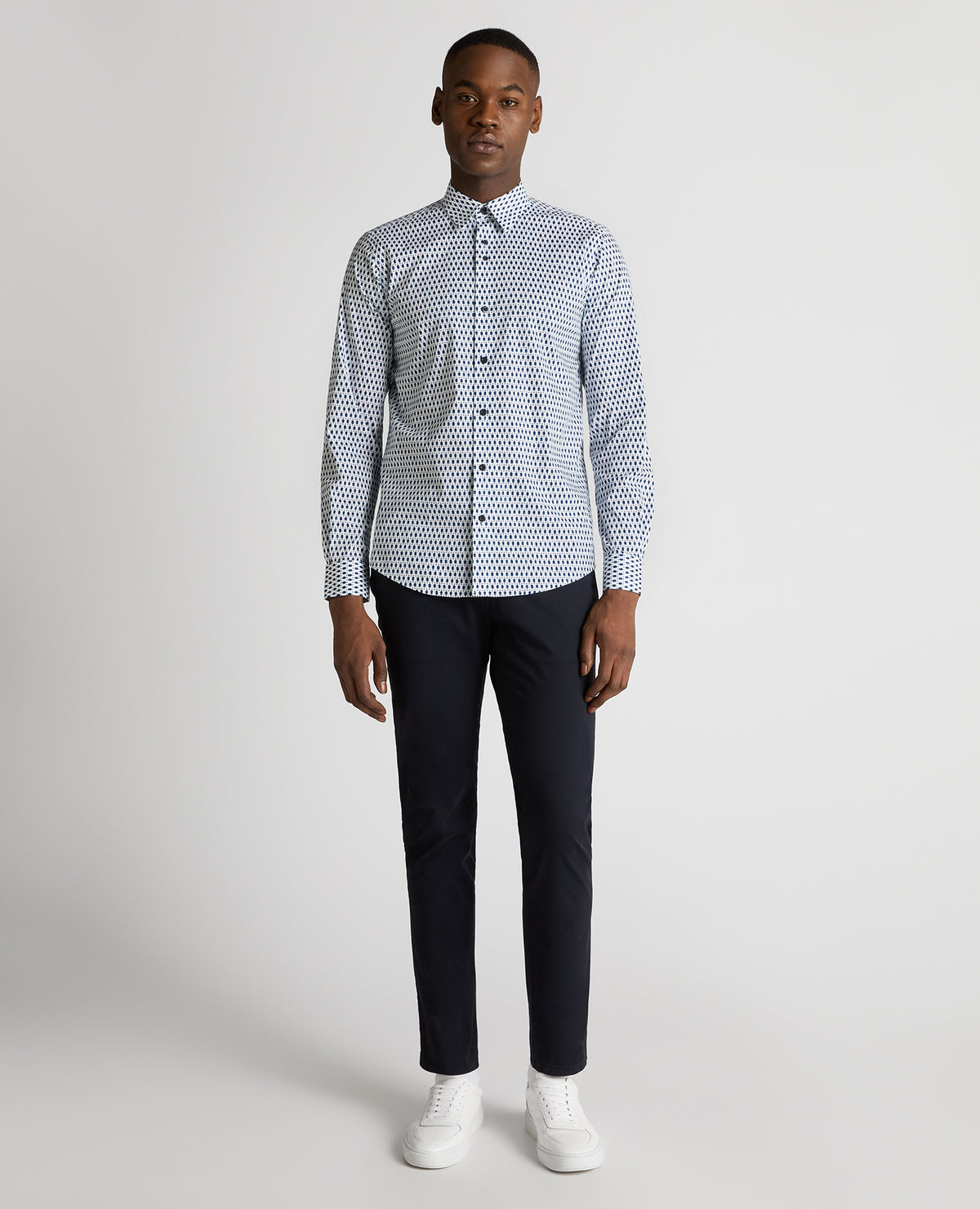 Man wearing a navy Regular Fit Print Cotton-Stretch Shirt
