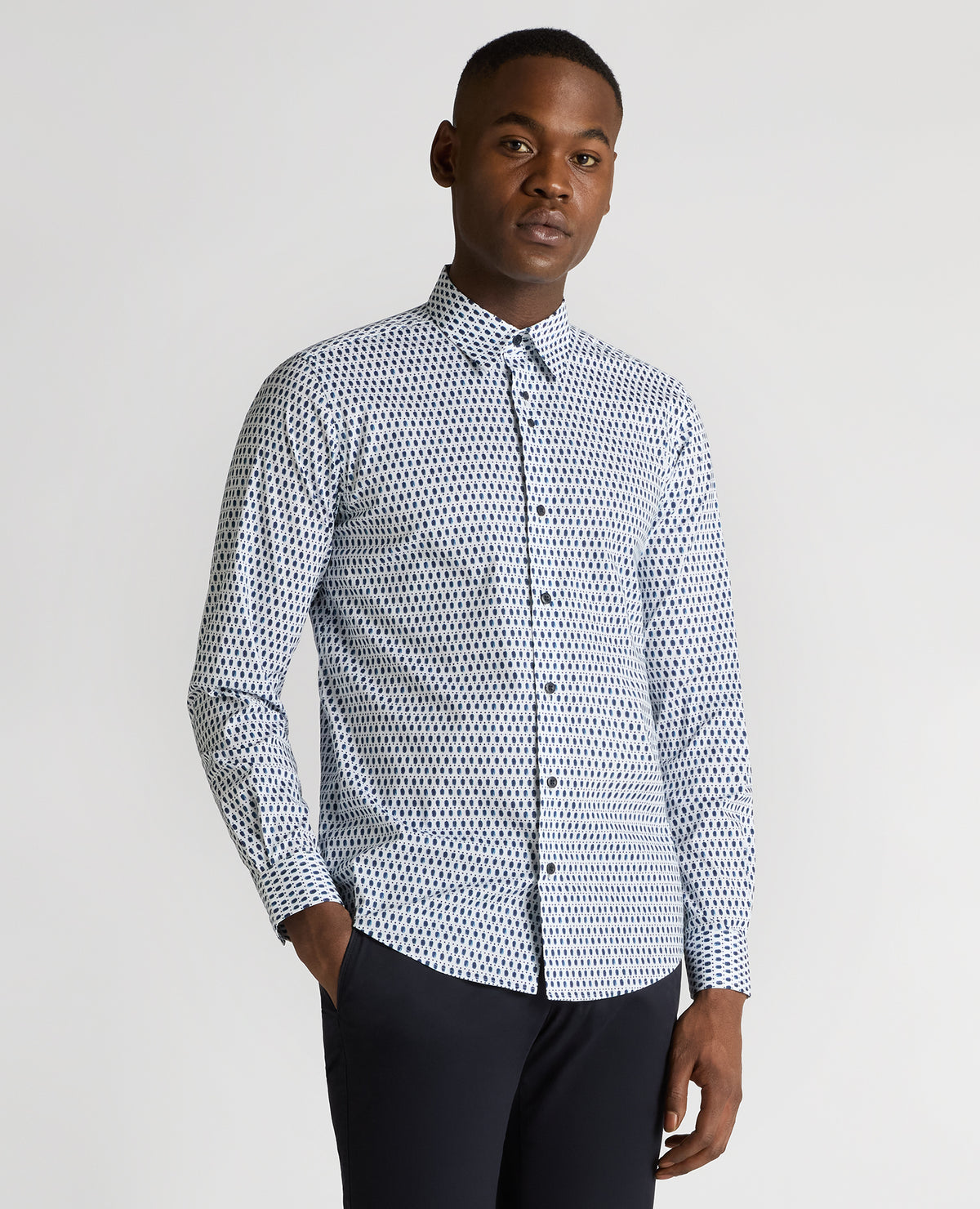 Man wearing a navy Regular Fit Print Cotton-Stretch Shirt